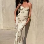 Dress with embossed floral embroidery.