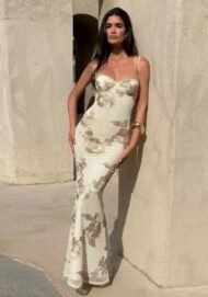 Dress with embossed floral embroidery.