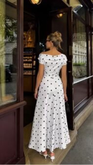 Women's dress with polka dot pattern and boat neckline - Image 3