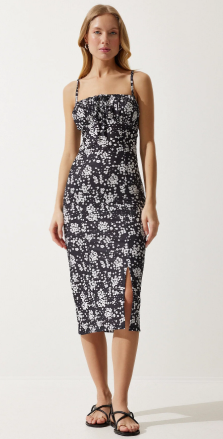 9daa8cde29c22a97e304d48a6d18263e.png Women's white black floral dress with slit summer knit - Image 1