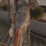 Green long dress with pattern and slit detail